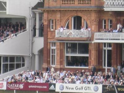 HER MAJESTY (THAT'S HER IN THE BLUE, SECOND FROM RIGHT IN THE BOX) MAKES AN APPEARANCE